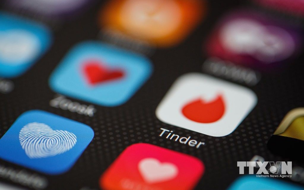 Tinder - ứng dụng hẹn hò trên điện thoại thông minh. (Ảnh: TTXVN) Tinder - ứng dụng hẹn hò trên điện thoại thông minh. (Ảnh: TTXVN)